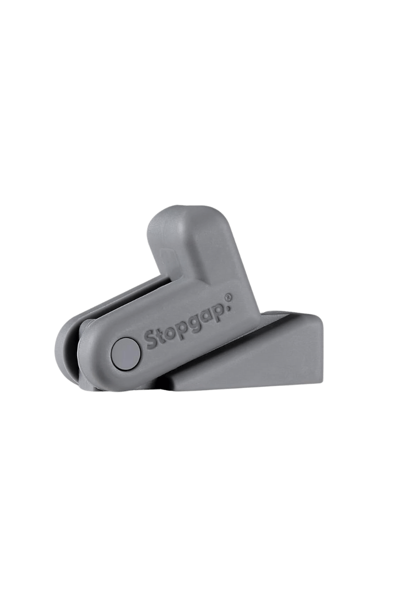 "Stopgap." Multifunctional doorstopper